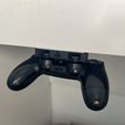 AD208820-95DB-471B-8D65-4A6EAD4028C6.jpeg PS4 Controller under table mount with LOGO