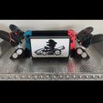 00_Case-Closed.jpg DELUXE Game Holder and Controller Charger Nintendo Switch Stand