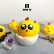 Chick_with_logo.jpg Petit poussin Hatchling Porte-clés Fidget Clicker Oeuf de Pâques
