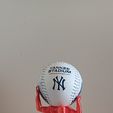 20240731_185344.jpg Atlas holding base ball