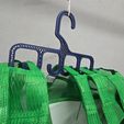 60d03314-d682-4091-aeed-e2625e1f6c8b.jpg Space-Saving Cap Hanger - No Supports