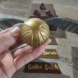 IMG_20230907_222031.jpg Harry Potter Golden Snitch 30 and 45 mm, with base and different signs.