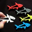 sharkz_display_large.jpg SHARKZ... Fun Multipurpose Clips / Holders / Pegs with moving jaws that bite!