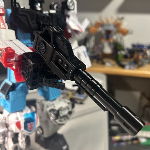 IMG_6067.jpg Transformers Defensor Combiner wars oversized phaser