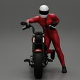 3DG-0002.jpg Motorbiker standing pushing his motorbike