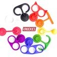 Series-2-Knuckies.jpg .5mm interlocking parts - The Original Knuckies Spinning Fidget Phone Stand