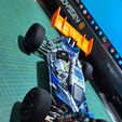 IMG-20231225-WA0037.jpg WLTOYS 124017 HIGH SPEED BUMPER V4 and Spoiler