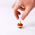 Umkehrkreisel-3.jpg Reversing spinning top magically turns to the other side