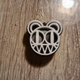 photo_5300954039975612115_y.jpg Radiohead logo keychains