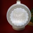 IMG_20230907_115456789.jpg Beauty And The Beast DISNEY CHRISTMAS ORNAMENT TEALIGHT WITH TWIST LOCK CAP