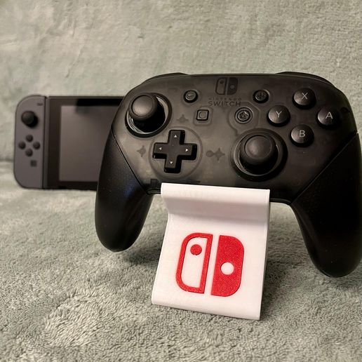 WhatsApp-Image-2024-10-09-at-13.48.19-2.jpeg Nintendo Switch - PRO CONTROLLER STAND -DISPLAY Switch LOGO