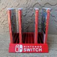 3c5dd1df5cf9d5b9578e251c5bb4f344_display_large.jpg Nintendo Switch Game Case Holder