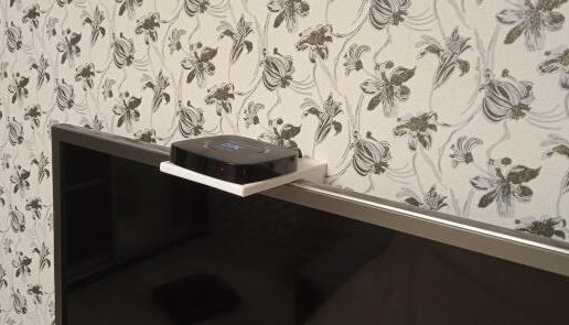 TV stand for a TV set-top box for a suspended TV.