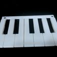 10fb15c77258a991b0028080a64fb42d_display_large.jpg replacement keys for Mini piano