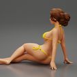 3DG-0005.jpg Femme sexy assise en bikini sur la plage