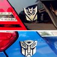 57f225403b4a716de60d34bf-large.jpg Autobot and Decepticons car emblem from Transformers