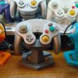 423737740_376223575275429_2004114136755716615_n.jpg Nintendo GameCube Controller Stand (Logo)