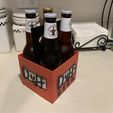 Photo_Jun_17_9_51_46_PM.jpg Duff Beer Carrier 4 pack and 6 pack