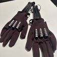 photo_5316615234489803735_y.jpg Retractive Wolverine claws