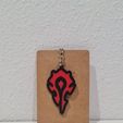 20251121_193621.jpg Horde WoW - Brinco e chaveiro