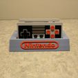 0c976e45f33c3961726de9a35d695b4a_display_large.jpg 8Bitdo NES30 Controller Holder