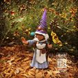 Photo-Jul-26,-9-23-52-AM-(1).jpg Gnomess Cleric, female gnome Tabletop RPG miniature or garden gnome