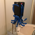 Popi sur la vitre.PNG Popi the Octopus, phone and jewelry holder