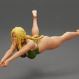 Girl-0001.jpg Beach Volleyball Girl in Bikini Returns a Ball in a Jump