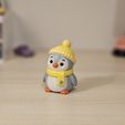 22220260524_223527.jpg Cozy Penguin Figure