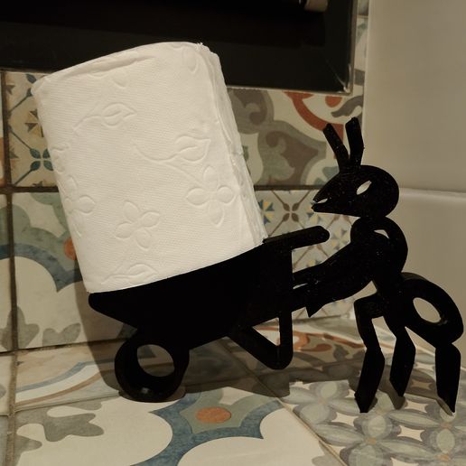 Toilet paper holder in the shape of an ant wheelbarrow