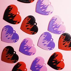 $184.jpg Flaming Heart Rings