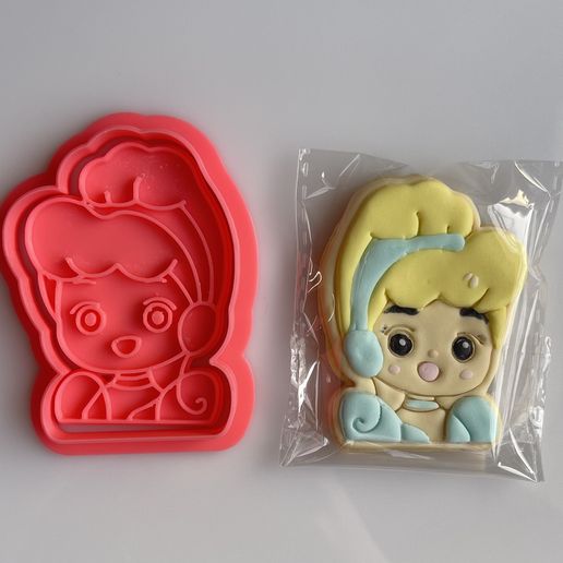 Quick take royal icing decorating of a Cinderella inspired dress cookie. | A Modern Cookie