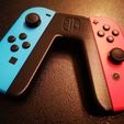 IMG_20200202_181719.jpg Dual Joycon Grip with Switch Logo