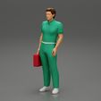 3DG-0006.jpg paramedic Standing And Holding first Aid box