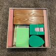 99dc3887-7682-4777-901e-0b693b0dd234.jpg Planted Board Game Organizer (by Phil Walker Harding)