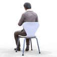 ManSitiing_1.12.61.jpg A Man sitting on a chair with smartphone