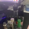 e154933c-59d6-49c4-b2db-6af360d8e743.jpg IStick Pico Melo 3 Mini (Vape) and 10ML and 60ML guerilla liquid stand