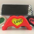 IMG_20230119_200828_edit_180653025462017.jpg Archivo STL Manos de corazón Soporte para teléfono y marco de fotos・Objeto de impresión 3D para descargar