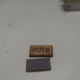 goldtest.jpg Buccaneer (1938) - board game - gold bar token