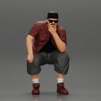 3DG2-0001.jpg Fat Gangster in cap and sunglasses sitting and thinking