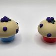 646380501_10237061181288197_1830579667863027826_n.jpg Blueberry Muffin Clicker Keychains