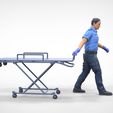 AW1-1.1.36.jpg N1 Ambulance worker pulling wheeled stretcher or trolley