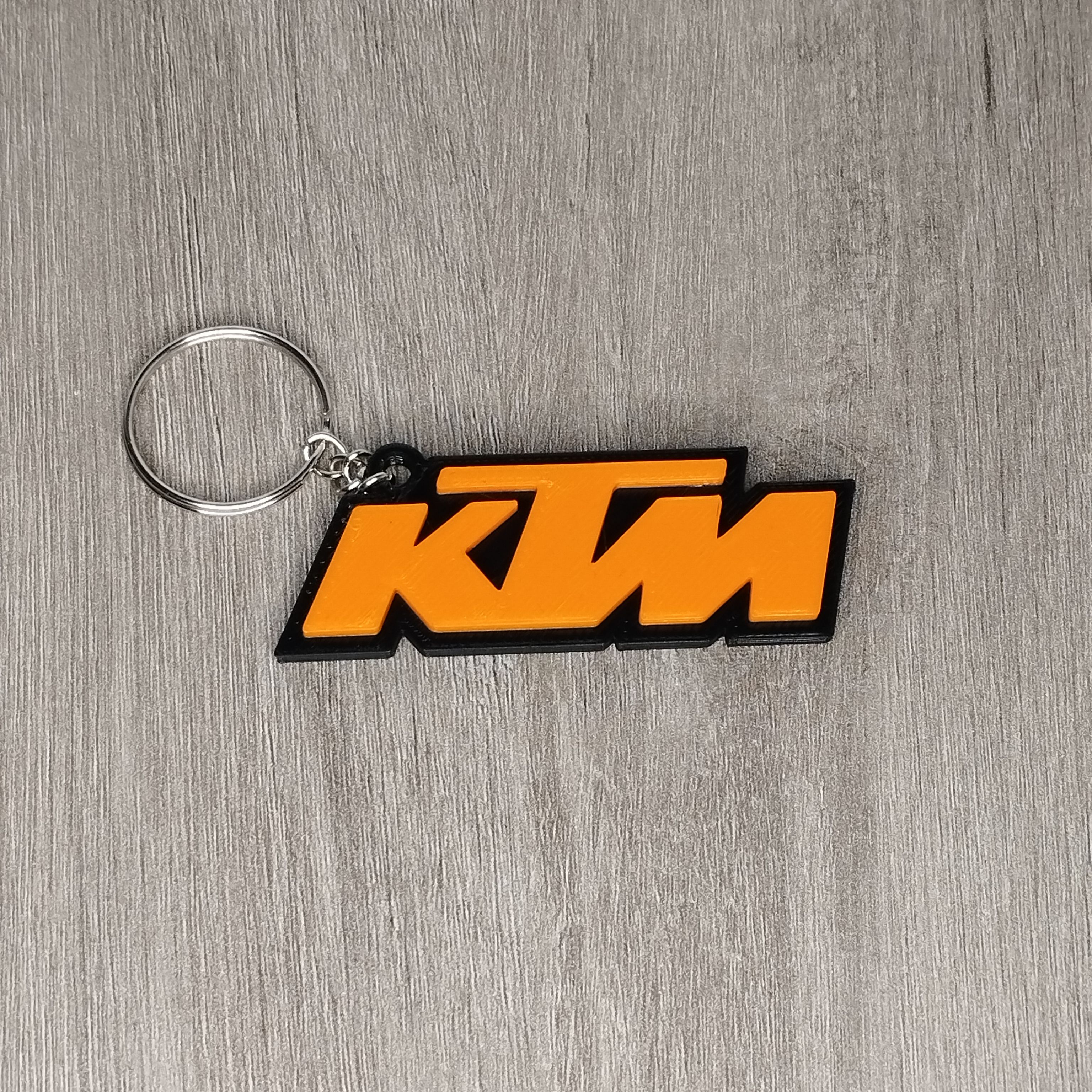 Download STL file KTM Logo Keyring • 3D printable object ・ Cults