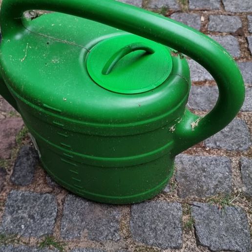 20220715_213904.jpg Tapa para la regadera