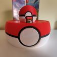 IMG_20230411_135430.jpg Stand for Nintendo Switch games in the shape of a Pokeball