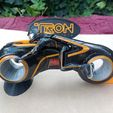 WhatsApp-Image-2024-03-27-at-1.54.27-PM.jpeg TRON LEGACY LIGHT CYCLE 20 FAN ART IN COLORS FOR ENDER 3 PRUSA MK3 FDM