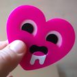 8dde7bb9-db49-46de-8325-8b53b38fd5b7.jpg The "horny heart" emoji 3d badge
