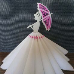 lady_with_umbrella.jpg Free STL file Lady with the umbrella. 3D quilling napkin holder.・3D printable model to download