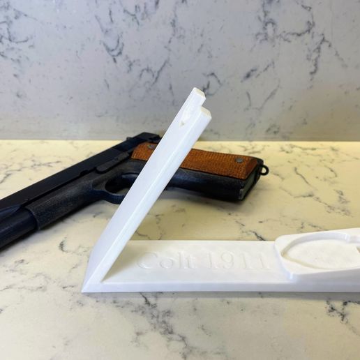 IMG_2357.jpg A demonstration stand for Colt 1911