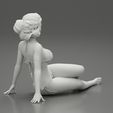 3DG-0009.jpg Femme sexy assise en bikini sur la plage